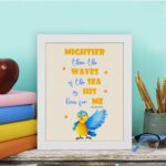 Wall art featuring a blue and yellow bird with the verse Mightier than the waves of the sea is His love for me from Psalm 93:4. displayed on the table in a white frame