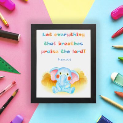 Colorful elephant wall art with the verse "Let everything that breathes praise the Lord!" for kids' room decor. displayed on the wall in a black frame in a colorful background