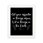 Set Your Affection on Things Above Colossians 3:2 Bible Verse Wall Art on white background with white text and leaf decorations. hung on the wall in a black frame