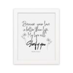 Wall art design with the text Because Your Love Is Better Than Life, My Lips Will Glorify You from Psalm 63:3. hung on the wall in a white frame