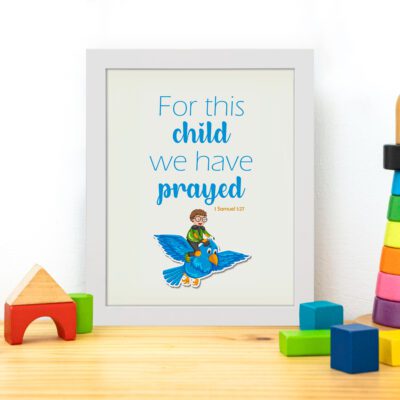 For This Child, We Have Prayed 1 Samuel 1:27 Bible Verse Wall Art with a child on blue bird illustration displayed on the table in a white frame