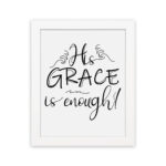 His Grace Is Enough Christian wall art in black cursive font on a white background emphasizing the word 'GRACE'. hung on the wall in a white frame