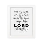 Not By Might Nor By Power Zechariah 4:6 Christian wall art with black text on a white background. hung on the wall in a white frame