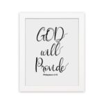 Infidu wall art with the text "GOD will provide" in black font on a white background, featuring the Bible verse Philippians 4:19. hung on the wall in a white frame