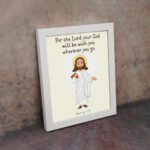 Jesus holding a staff with the verse For the Lord your God will be with you on cream background wall art for kids. displayed on the wall in a white frame