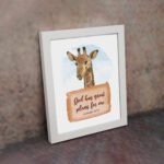 Jeremiah 29:11 Bible verse wall art featuring a cheerful giraffe on a sky-blue background, designed for children's rooms. displayed on the wall in a white frame