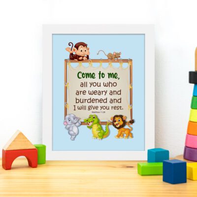 Bible verse wall art for kids with Matthew 11:28 and cartoon animals on a light blue background. displayed on the table in a white frame