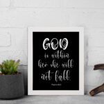 God Is Within Her, She Will Not Fall Psalm 46:5 Bible verse wall art in white text on a black background. displayed on the wall in a white frame