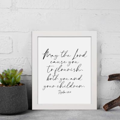 Elegant wall art featuring Psalm 115:14 in cursive font, black text on a white background. Wall Art displayed on the wall in a white frame