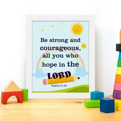 Be Strong And Courageous Psalm 31:24 Bible Verse Wall Art with sun and stars on a sky blue background for kids. displayed on the table in a white frame