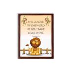 Friendly lion illustration with the verse The Lord is my shepherd, he will take care of me on a light peach background. hung on the wall in a brown frame