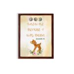 Artwork of a baby deer with flowers and the verse God knew me before I was born in warm colors. Perfect for children's decor. hung on the wall in a brown frame