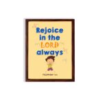 Rejoice in the Lord always, Philippians 4:4 Christian wall art with smiling child and bright colors. hung on the wall in a brown frame