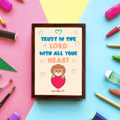 Cute teddy bear holding a heart with Trust in the Lord with all your heart text above, Proverbs 3:5 wall art design. displayed on the wall in a brown frame in a colorful background