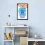 Wall art depicting two hands holding each other with the verse Let the little children come to me in blue text on a watercolor background. displayed on the wall in a brown frame