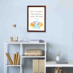 Colorful elephant wall art with the verse "Let everything that breathes praise the Lord!" for kids' room decor. displayed on the wall in a brown frame