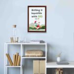 Wall art for kids featuring a happy cat in a Santa outfit holding a gift with the text Nothing is impossible with God. displayed on the wall in a brown frame