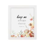 Keep Me As The Apple Of Your Eye Psalm 17:8 Bible Verse Wall Art with watercolor fruits and flowers. Wall Art hung on the wall in white frame