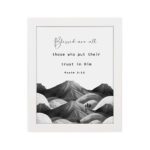 Psalm 2:12 Bible wall art featuring a black-and-white mountain landscape with the verse Blessed are all those who put their trust in Him. Wall Art hung on the wall in a white frame