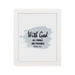 With God All Things Are Possible Matthew 19:26 Bible Verse Wall Art with black text and light blue brushstroke on white background. Wall Art hung on the wall in a white frame