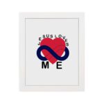 Infidu Jesus Loves Me Bible Wall Art with red heart and blue infinity symbol, with the text JESUS LOVES ME around the image Wall Art hung on the wall in white frame