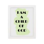 Infidu I Am A Child Of God Bible Wall Art with light green shape and black text on a white background Wall Art hung on the wall in white frame