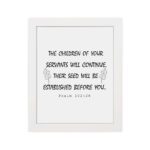 Bible verse wall art with Psalm 102:28 in black text on a white background, featuring decorative leaf designs for an elegant touch. hung on the wall in a white frame