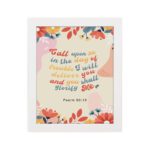 Psalm 50:15 Bible Verse Wall Art with colorful text, floral patterns, bird illustration, and beige background. Wall Art hung on the wall in a white frame