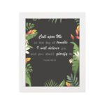 Psalm 50:15 Bible Verse Wall Art with white text, tropical leaves, and black background. Wall Art hung on the wall in a white frame