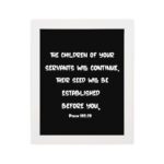 Bible verse wall art with Psalm 102:28 in bold white text on a black background. Centered and simple design for easy readability. hung on the wall in a white frame