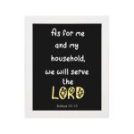 Joshua 24:15 Bible verse wall art with LORD in yellow on a black background. Inspiring Christian home decor by Infidu. Wall Art hung on the wall in a white frame