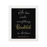 Ecclesiastes 3:11 Bible verse wall art with Beautiful yellow script on a black background. Inspiring Christian decor by Infidu. Wall Art hung on the wall in a white frame