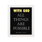 Matthew 19:26 Bible verse wall art with bold text, WITH GOD in yellow on a black background. Christian decor by Infidu. Wall Art hung on the wall in a white frame