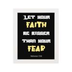 Christian wall art with Hebrews 13:6 verse on a black background, yellow and white font white frame hung on the wall