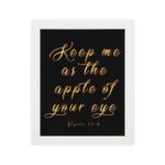 Keep Me As The Apple Of Your Eye Psalm 17:8 gold cursive text on black background - Christian wall art for home decor hung on the wall in a white frame