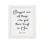 Blessed Are All Those Who Put Their Trust In Him Psalm 2:12 black cursive text on white background - Christian wall art hung on the wall in a white frame