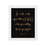 Psalm 18:3 wall art with gold text I will call upon the Lord on a black background in a black frame. Christian home decor. hung on the wall in a white frame