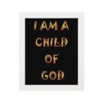 I Am A Child Of God Bible wall art with bold golden yellow text on a black background. Wall Art hung on the wall in a white frame