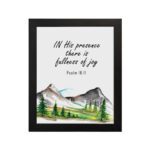 In His Presence There Is Fullness of Joy - Psalm 16:11 Bible Verse Wall Art with Mountains and Trees on White Background Wall Art hung on the wall in black frame