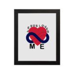 Infidu Jesus Loves Me Bible Wall Art with red heart and blue infinity symbol, with the text JESUS LOVES ME around the image Wall Art hung on the wall in black frame