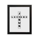 Infidu Jesus Loves Me Bible Wall Art with the crossword-style layout in black text on a white background Wall Art hung on the wall in black frame