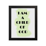 Infidu I Am A Child Of God Bible Wall Art with light green shape and black text on a white background Wall Art hung on the wall in black frame