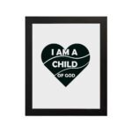 Infidu I Am A Child Of God Bible Wall Art with a dark green heart and white text on a white background Wall Art hung on the wall in a black frame