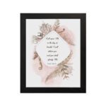 Psalm 50:15 Bible Wall Art with elegant black text, botanical patterns, and pink watercolor accents on a pale white background. Wall Art hung on the wall in a black frame