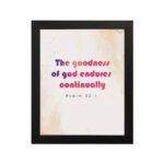 The Goodness Of God Endures Continually Psalm 52:1 Christian Wall Art with bold black and red text on a light cream background. Wall Art hung on the wall in a black frame