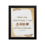 Christian wall art featuring Isaiah 60:22 with elegant text and a peach background, highlighting 'The Lord will make it happen. Wall Art hung on the wall in a black frame