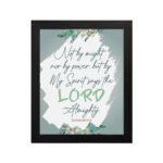 Infidu Zechariah 4:6 Christian wall art with decorative design and floral accents, featuring Not by Might, But by My Spirit. wall art hung on the wall in a black frame