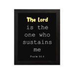 Psalm 54:4 Bible Verse Wall Art - The Lord Is The One Who Sustains Me in bold text on a black background for Christian home decor. Wall Art hung on the wall in a black frame