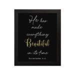 Ecclesiastes 3:11 Bible verse wall art with Beautiful yellow script on a black background. Inspiring Christian decor by Infidu. Wall Art hung on the wall in a black frame