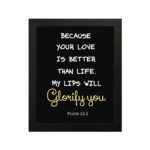 Psalm 63:3 Bible verse wall art with a dark background and cursive Glorify You in light gold. Christian home decor by Infidu. Wall Art hung on the wall in a white background